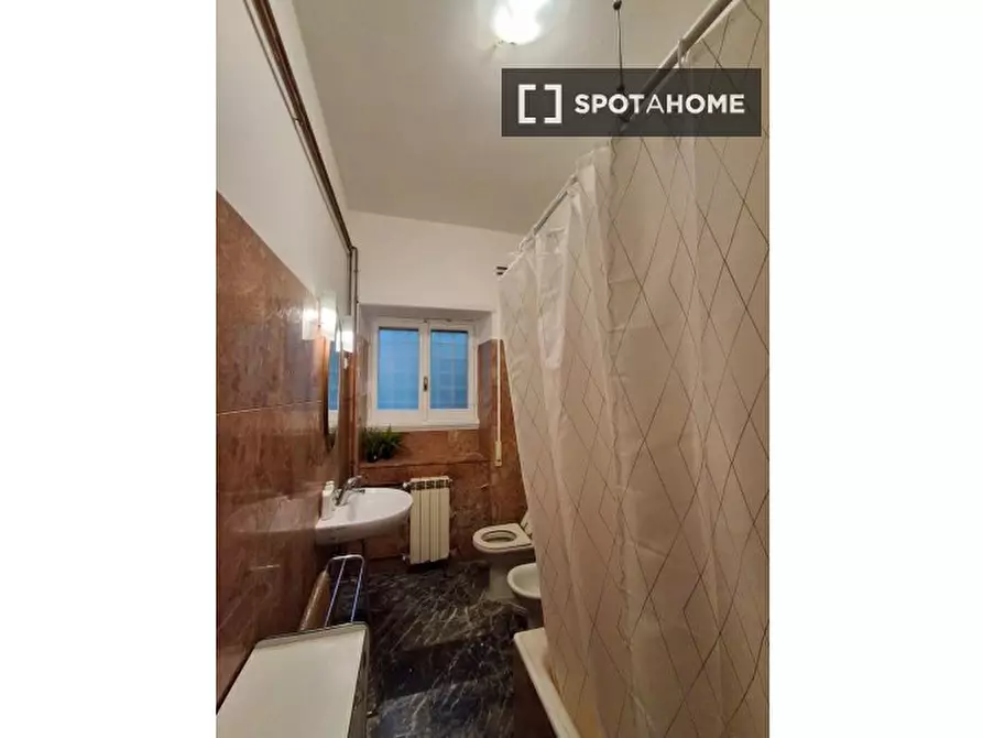 Immagine 9 di Camera condivisa in affitto  in Via Carlo Zucchi a Roma