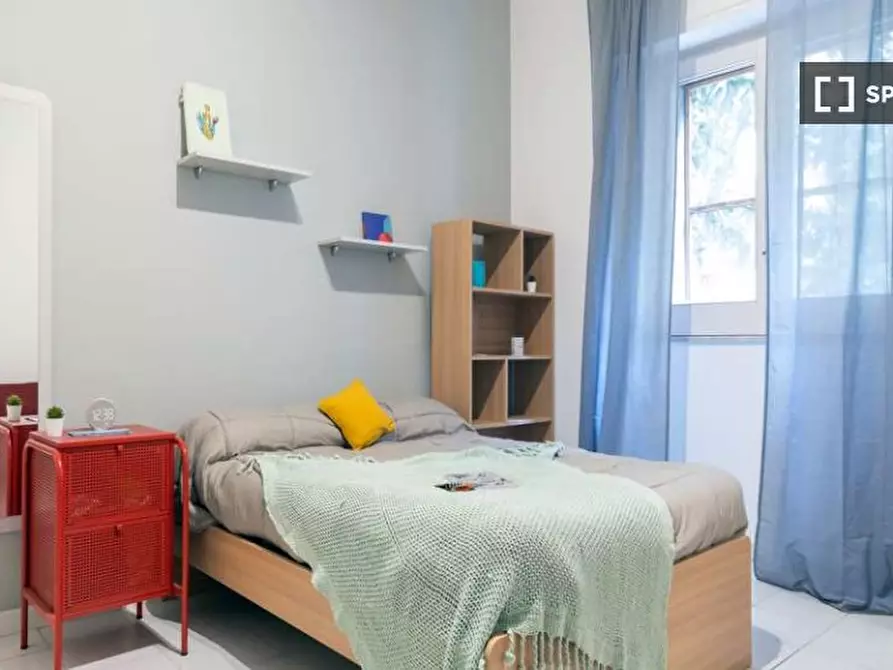 Immagine 7 di Camera condivisa in affitto  in Via Benaco a Roma