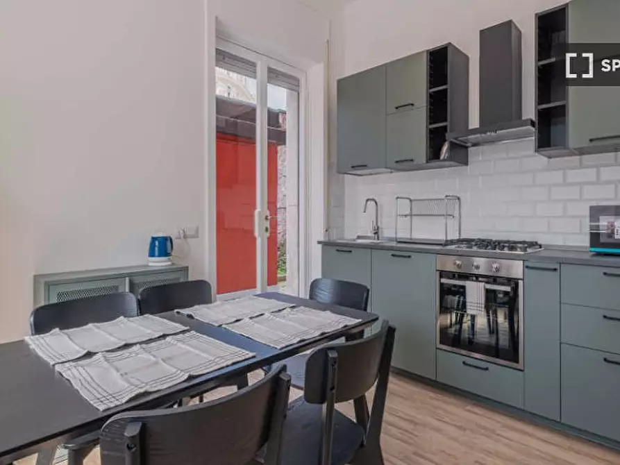 Immagine 5 di Camera condivisa in affitto  in Via Gualtiero Castellini a Roma