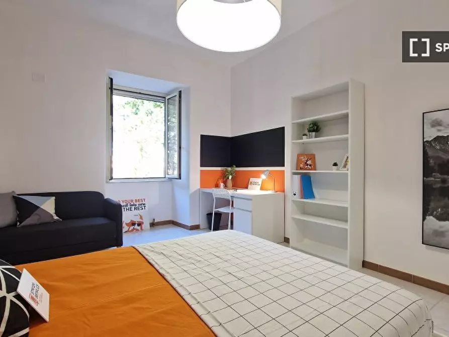 Immagine 10 di Camera condivisa in affitto  in Via Ostiense a Roma