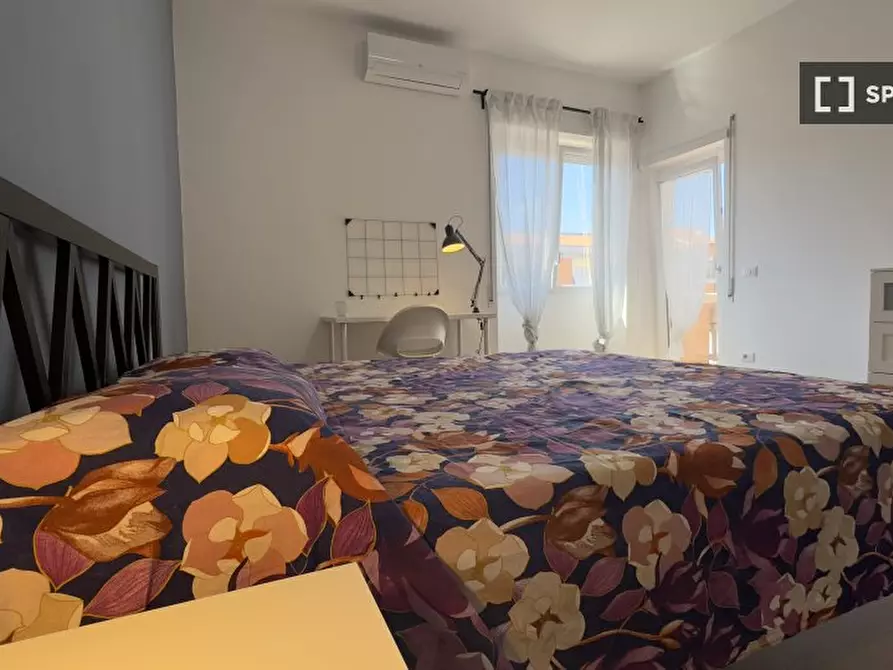 Immagine 15 di Camera condivisa in affitto  in Via Salvatore Pincherle a Roma