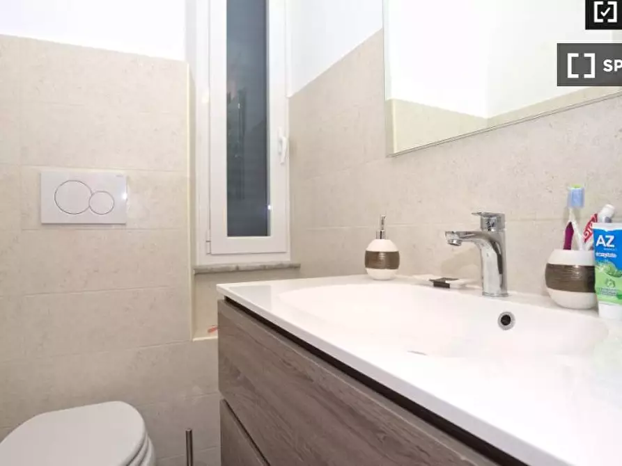 Immagine 1 di Camera condivisa in affitto  in Via Albalonga a Roma