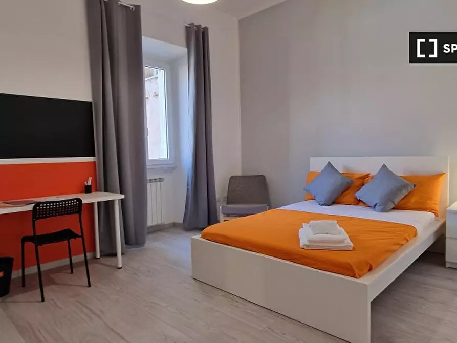 Immagine 3 di Camera condivisa in affitto  in Via Ostiense a Roma