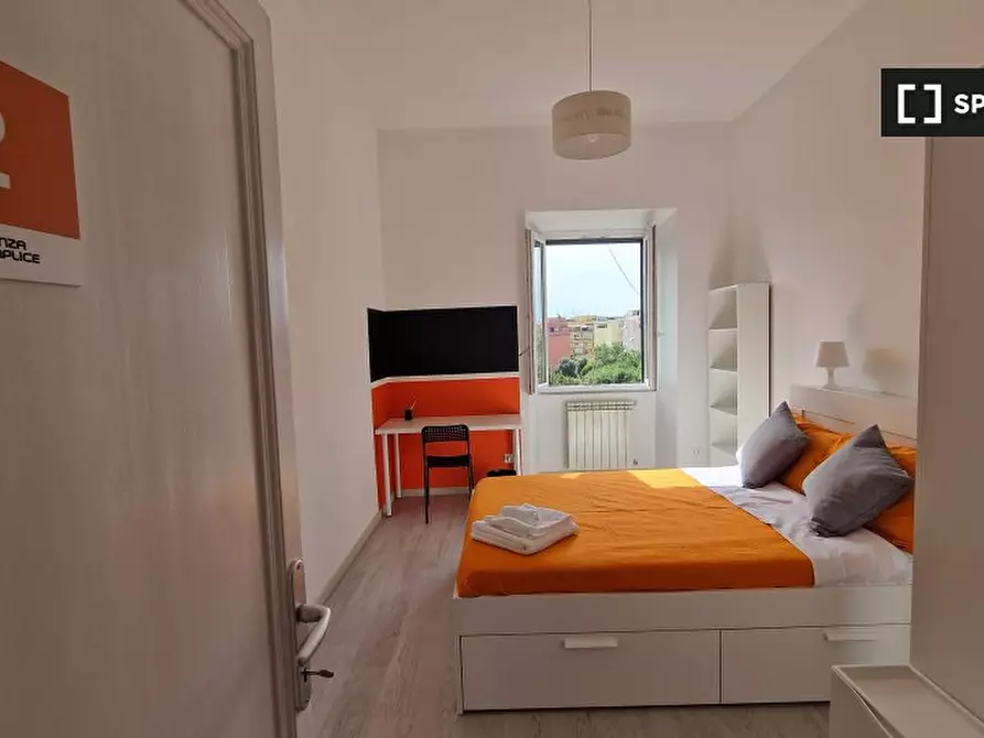 Immagine 8 di Camera condivisa in affitto  in Via Ostiense a Roma