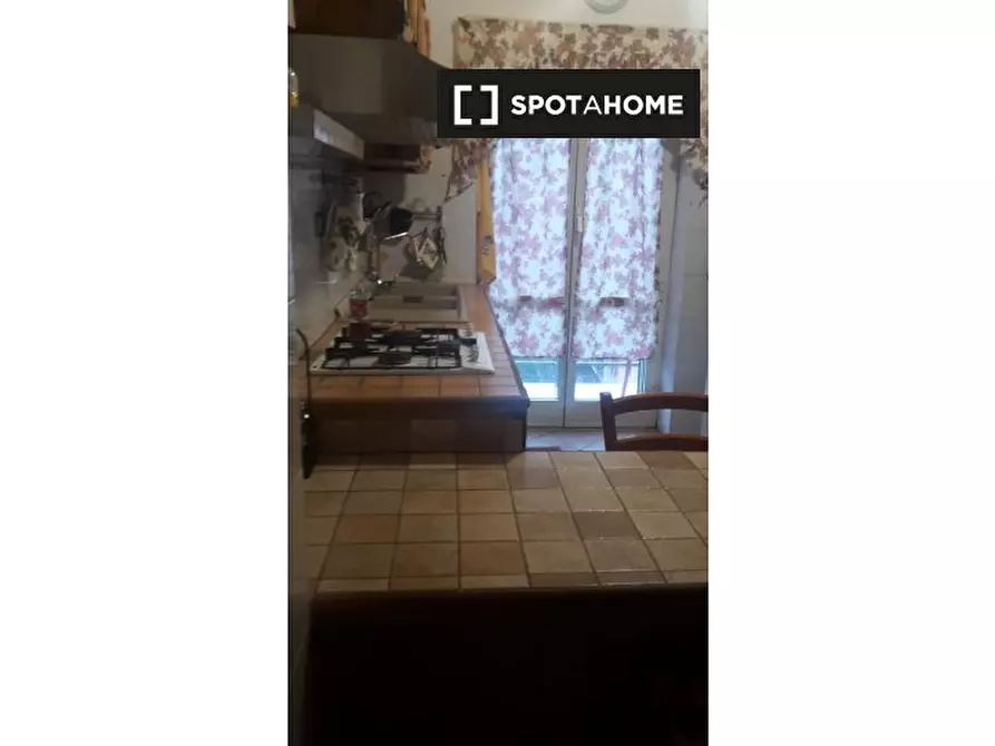 Immagine 8 di Camera condivisa in affitto  in Via Garessio a Roma