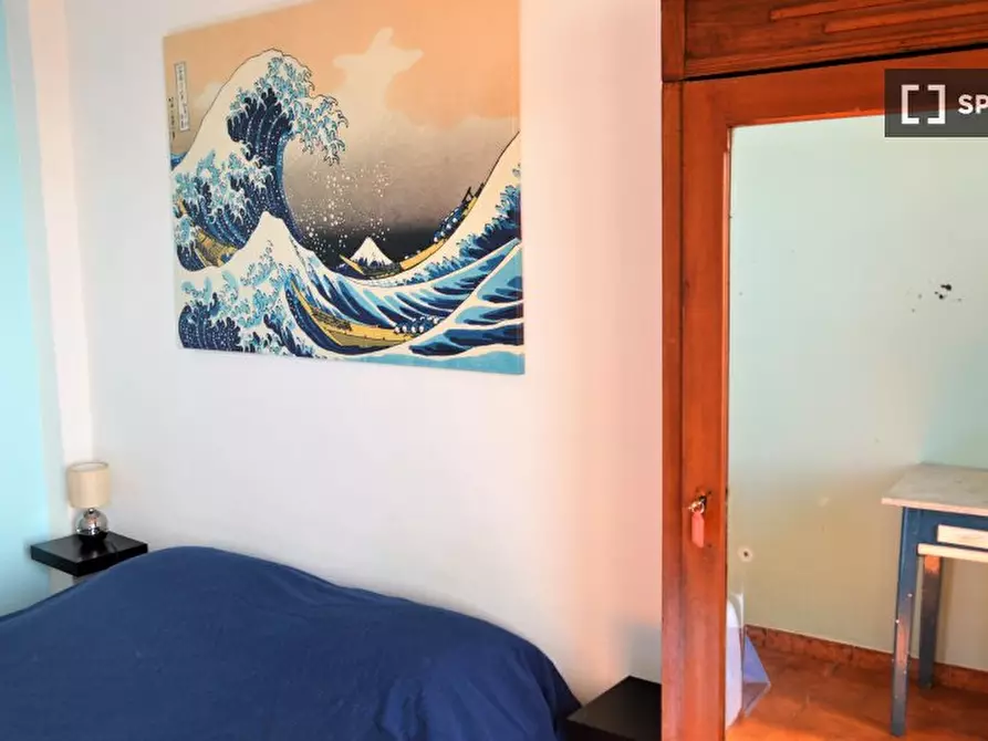 Immagine 3 di Camera condivisa in affitto  in Via Sinuessa a Roma