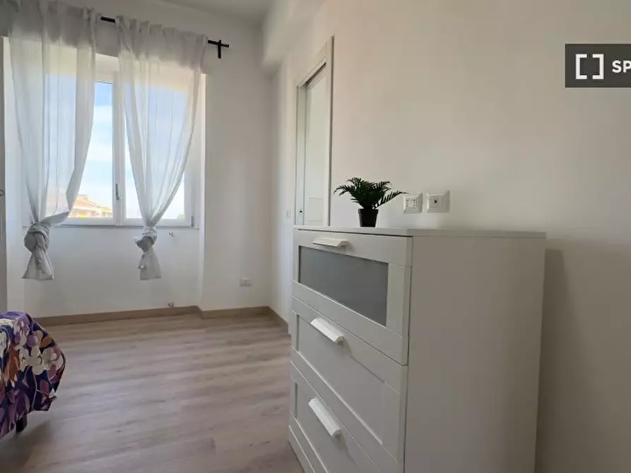 Immagine 9 di Camera condivisa in affitto  in Via Salvatore Pincherle a Roma