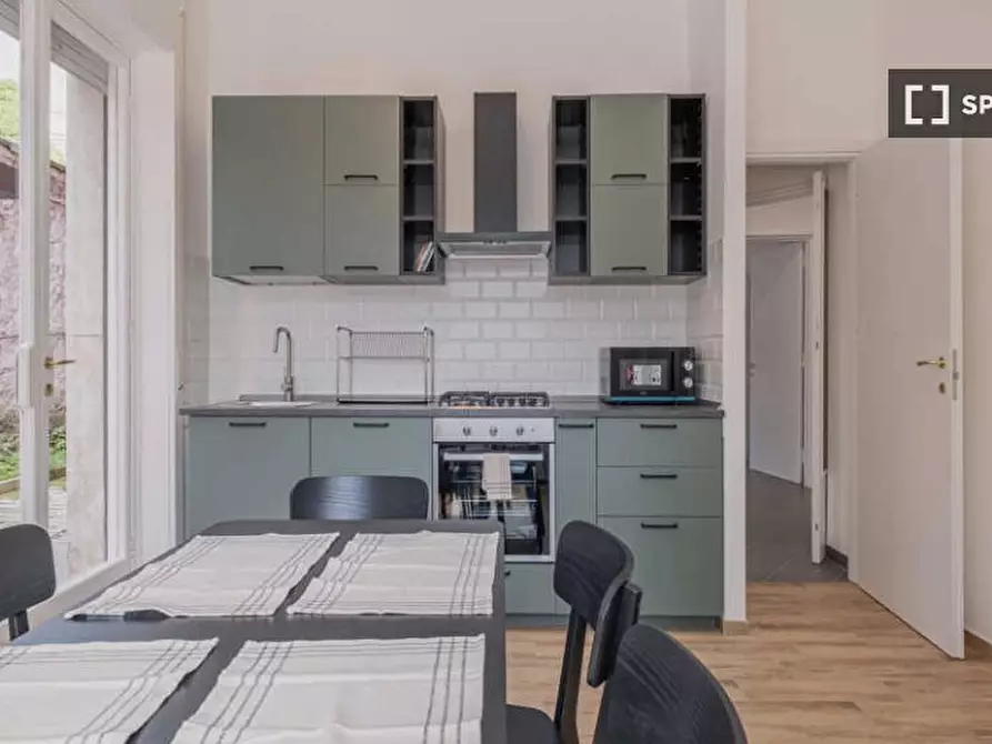 Immagine 4 di Camera condivisa in affitto  in Via Gualtiero Castellini a Roma