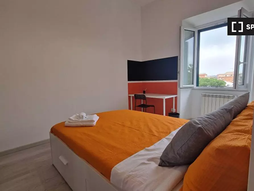 Immagine 15 di Camera condivisa in affitto  in Via Ostiense a Roma