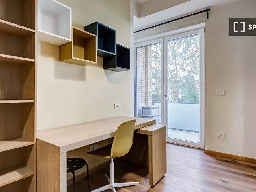 Immagine 17 di Camera condivisa in affitto  in Via Ostiense a Roma