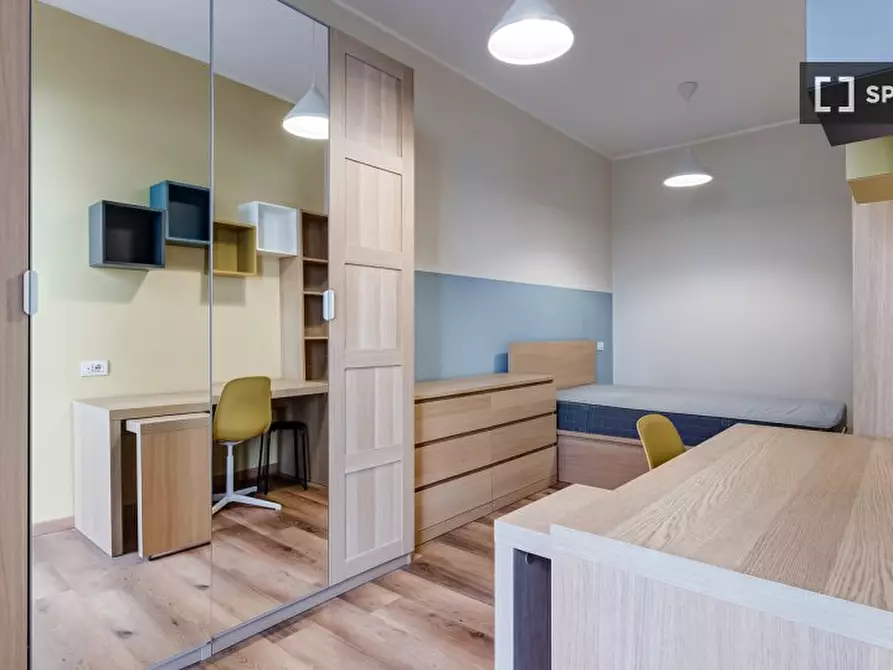 Immagine 19 di Camera condivisa in affitto  in Via Ostiense a Roma