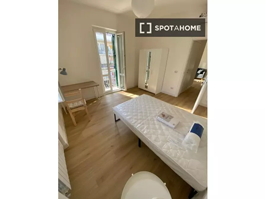 Immagine 2 di Camera condivisa in affitto  in Via Vincenzo Tomassini a Roma
