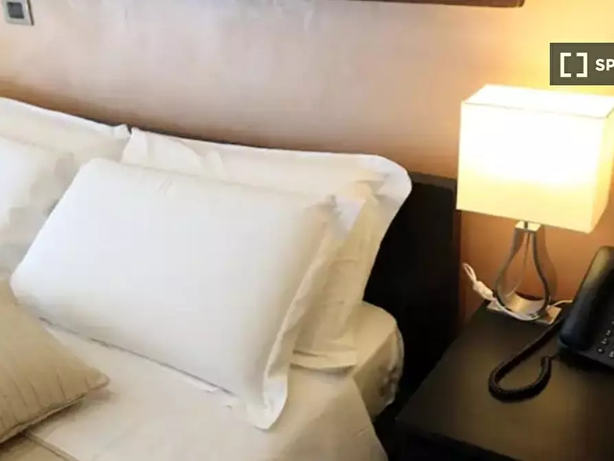 Immagine 1 di Camera condivisa in affitto  in Viale Carlo Felice a Roma