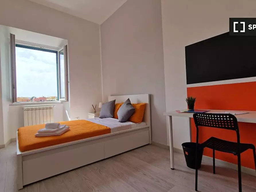 Immagine 11 di Camera condivisa in affitto  in Via Ostiense a Roma