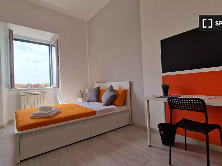 Immagine 2 di Camera condivisa in affitto  in Via Ostiense a Roma