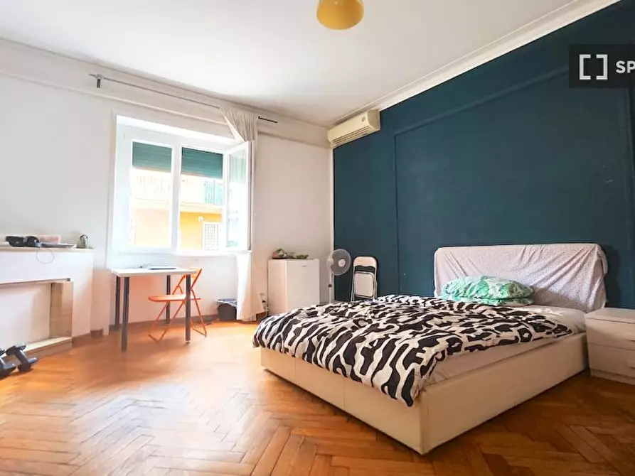 Immagine 1 di Camera condivisa in affitto  in Via Oreste Tommasini, 00162 Roma RM, Italy a Roma