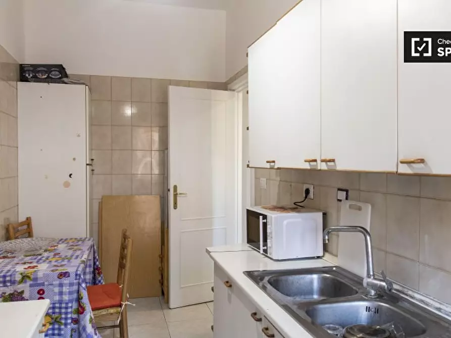 Immagine 9 di Camera condivisa in affitto  in Via Muzio Scevola a Roma