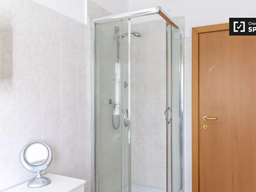 Immagine 8 di Camera condivisa in affitto  in Via Portuense a Roma