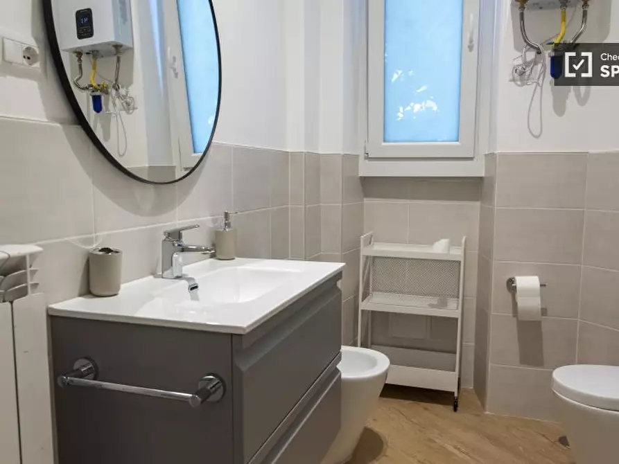 Immagine 6 di Camera condivisa in affitto  in Via Crema a Roma