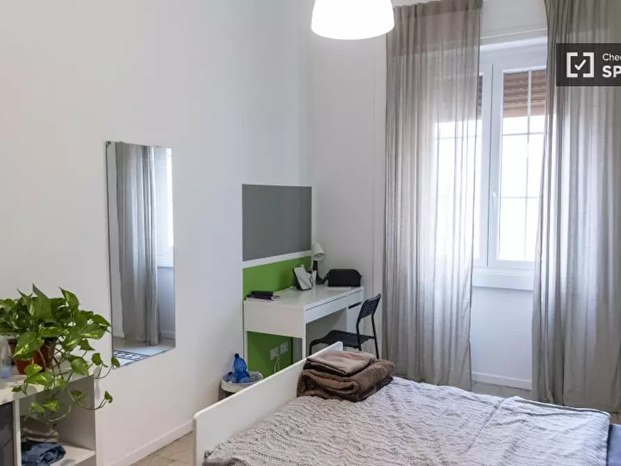 Immagine 17 di Camera condivisa in affitto  in Via Costantino Corvisieri a Roma
