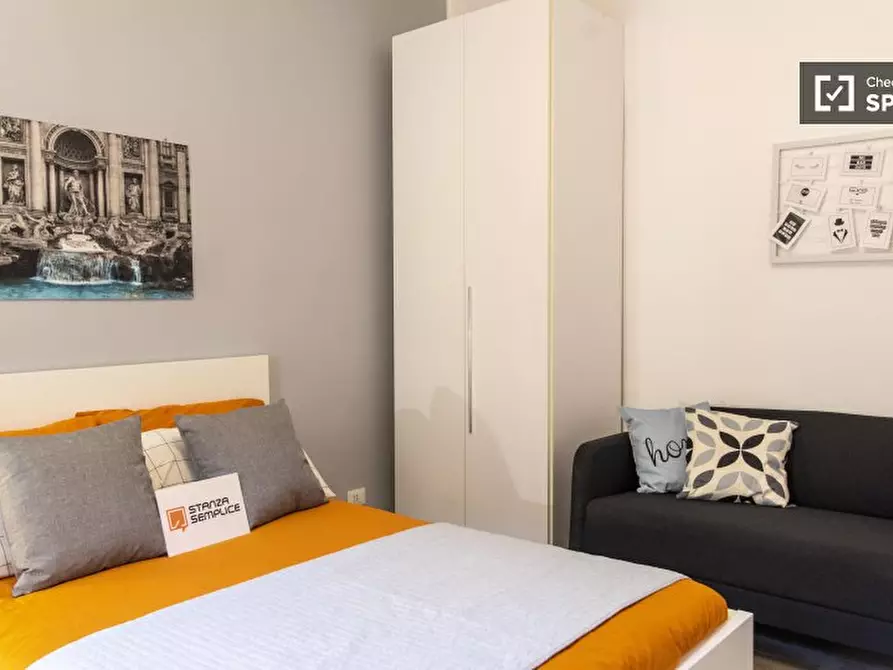 Immagine 2 di Camera condivisa in affitto  in Via in Selci a Roma