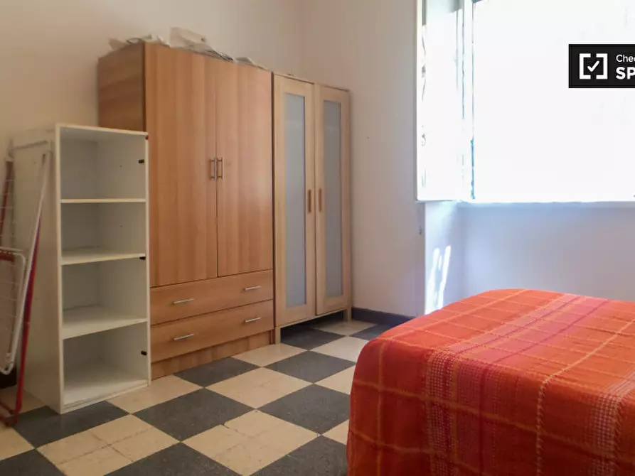 Immagine 16 di Camera condivisa in affitto  in Via Berengario a Roma