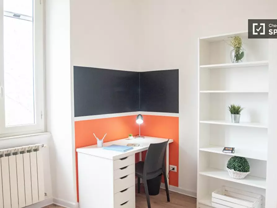 Immagine 14 di Camera condivisa in affitto  in Via Ostiense a Roma