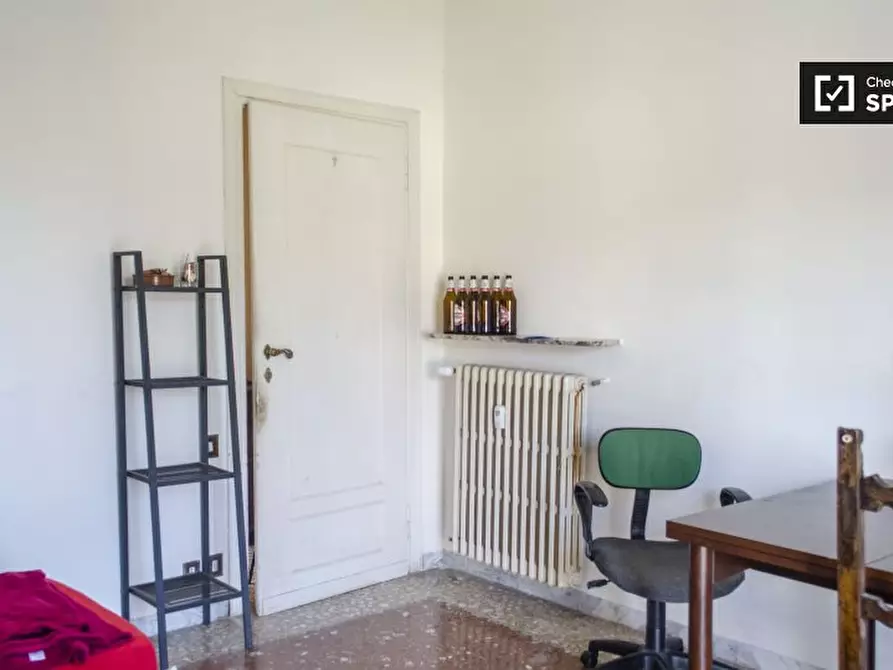 Immagine 2 di Camera condivisa in affitto  in Via Ozanam a Roma