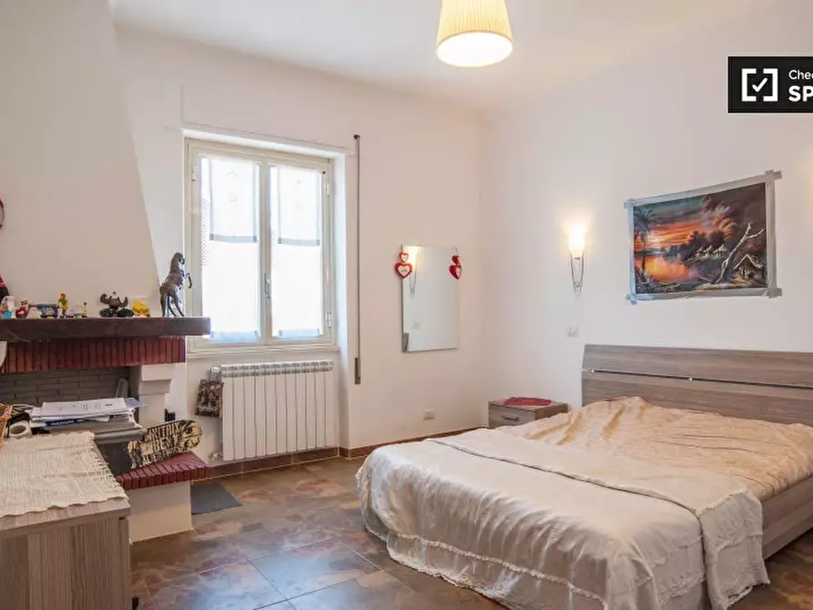 Immagine 3 di Camera condivisa in affitto  in Via Giovanni Battista Bastianelli a Roma