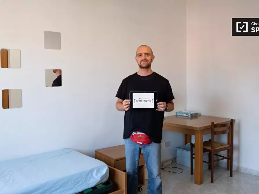 Immagine 6 di Camera condivisa in affitto  in Via Alfonso Borelli a Roma