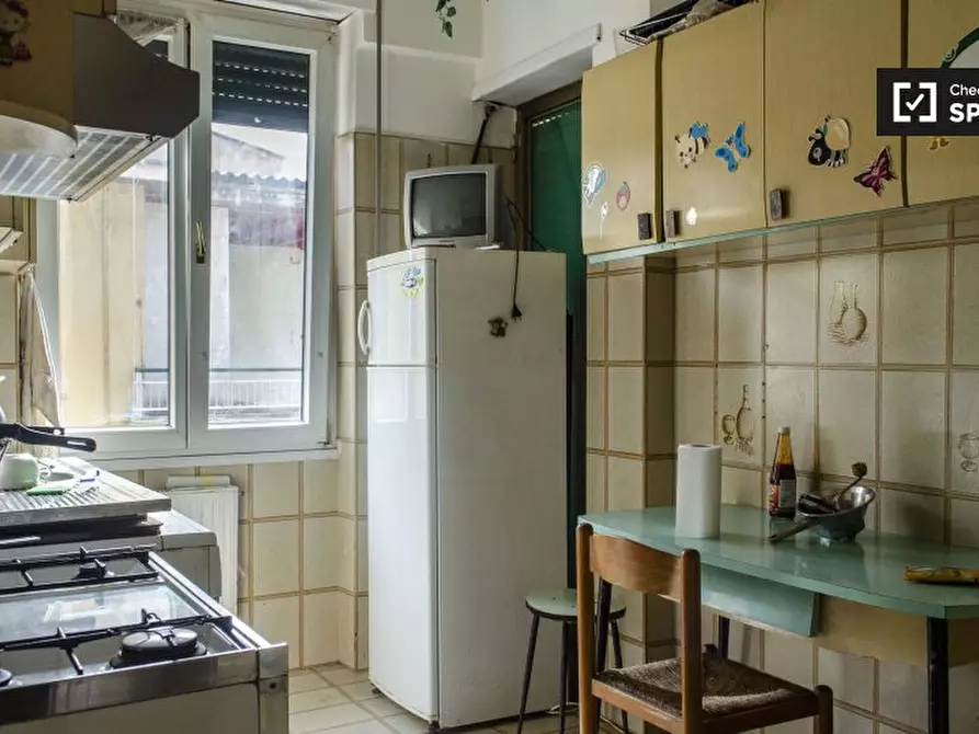 Immagine 12 di Camera condivisa in affitto  in Via Ozanam a Roma