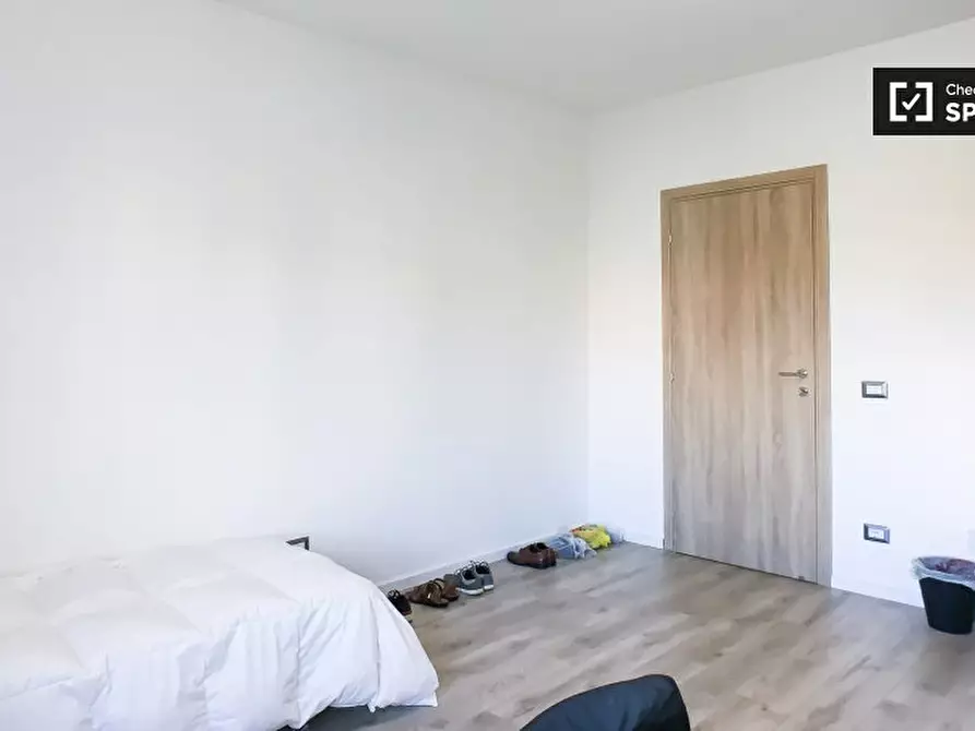 Immagine 3 di Camera condivisa in affitto  in Viale Giustiniano Imperatore a Roma