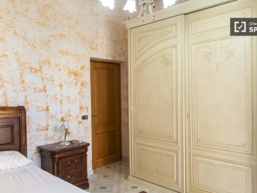 Immagine 5 di Camera condivisa in affitto  in Via Simone Ghini a Roma