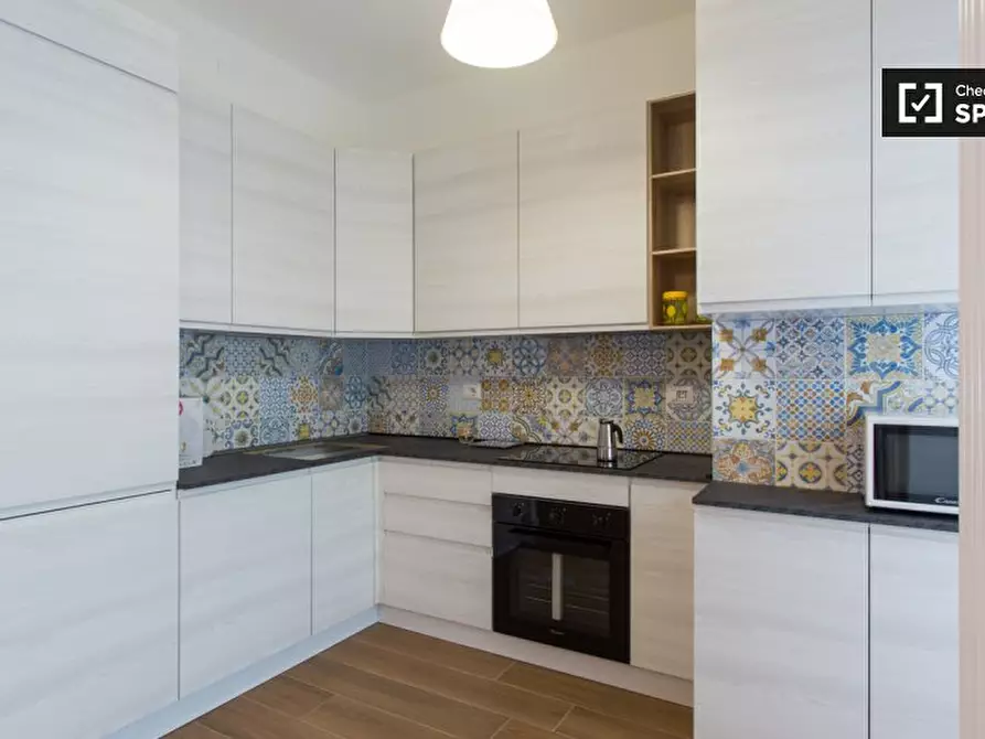 Immagine 11 di Camera condivisa in affitto  in Via delle Genziane a Milano