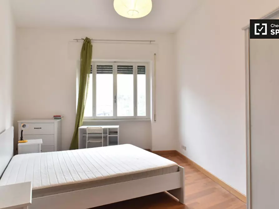 Immagine 5 di Camera condivisa in affitto  in Via Lorenzo Valla a Roma