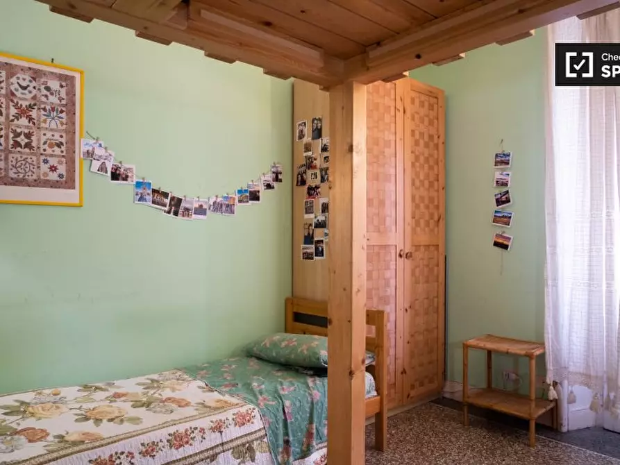 Immagine 4 di Camera condivisa in affitto  in Via Antonio Gallonio, 00161 Roma RM, Italy a Roma