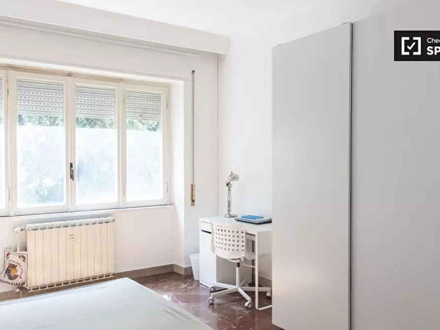 Immagine 2 di Camera condivisa in affitto  in Via Tito Omboni a Roma