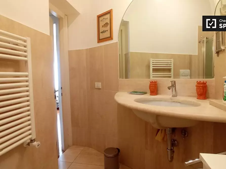 Immagine 4 di Camera condivisa in affitto  in Via Lima a Roma