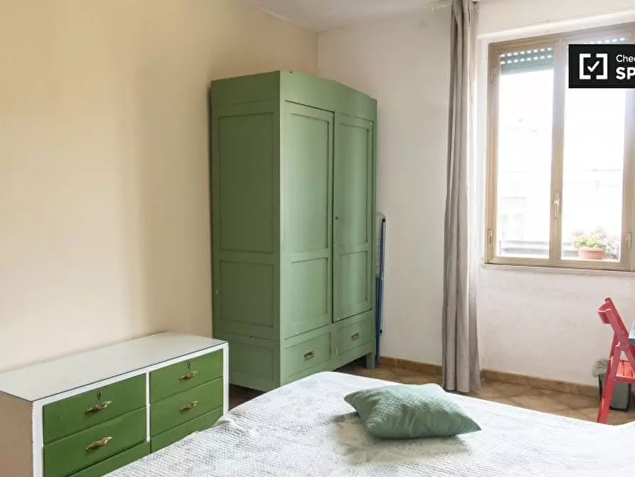 Immagine 3 di Camera condivisa in affitto  in Via Sinuessa a Roma