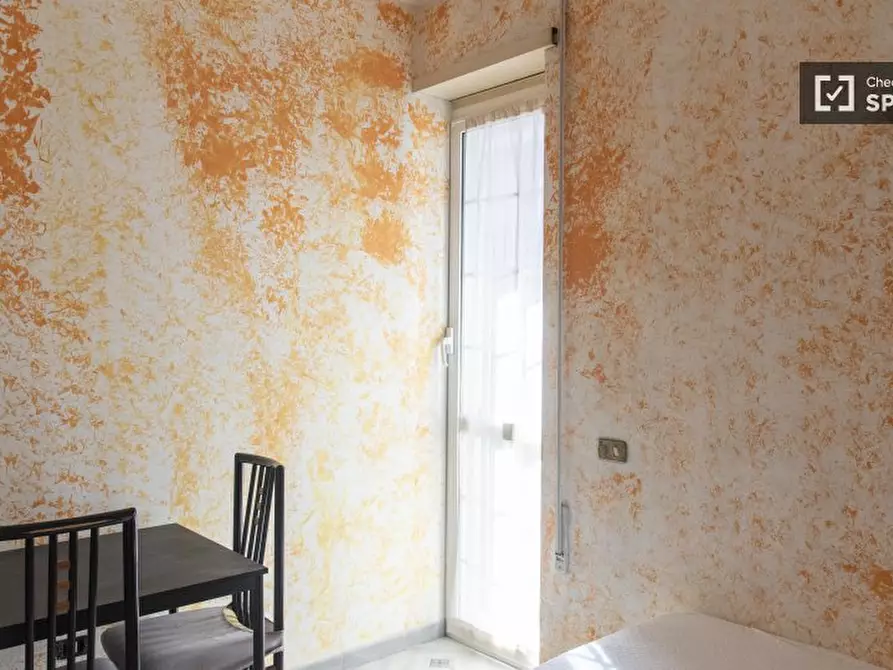 Immagine 4 di Camera condivisa in affitto  in Via Simone Ghini a Roma