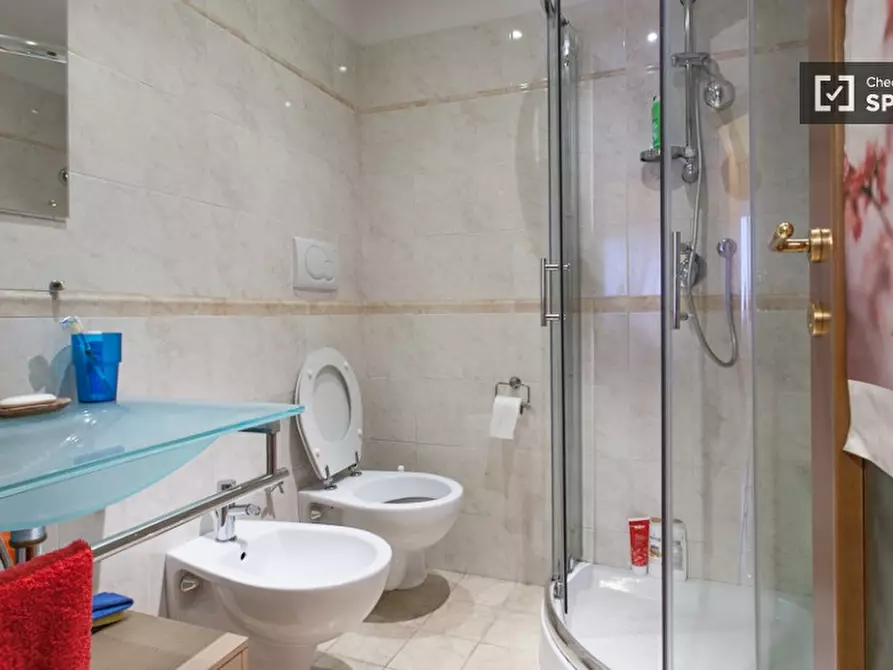 Immagine 16 di Camera condivisa in affitto  in Via Montefalco a Roma