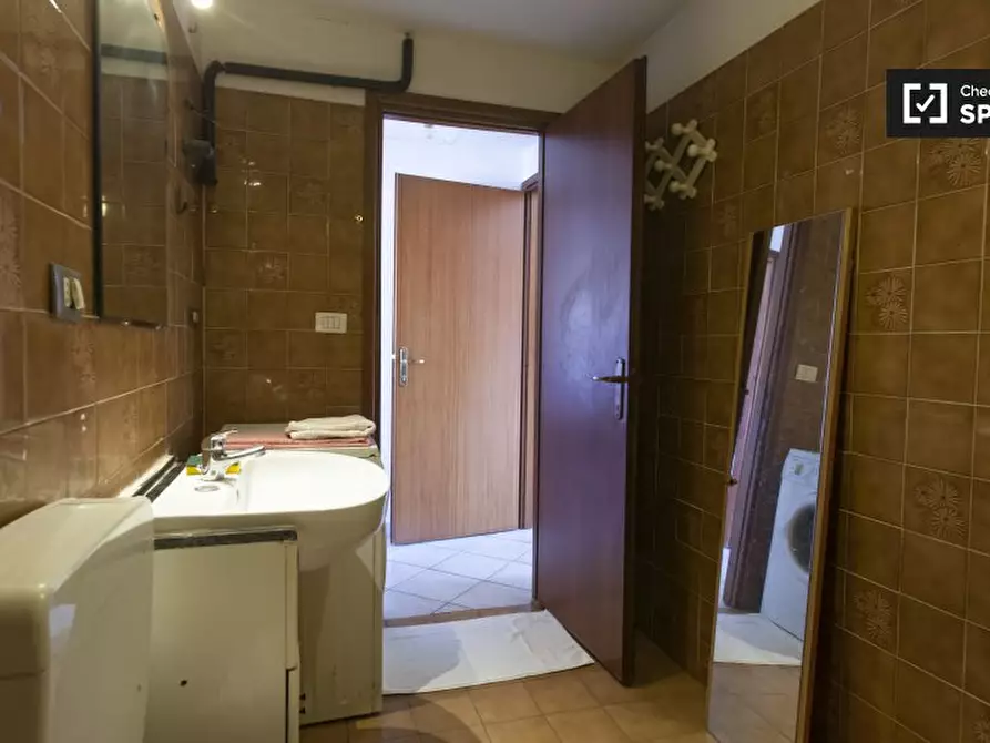 Immagine 13 di Camera condivisa in affitto  in Via Valentino Banal, 00177 Roma RM, Italy a Roma