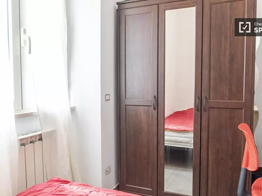 Immagine 16 di Camera condivisa in affitto  in Via Grottaferrata a Roma