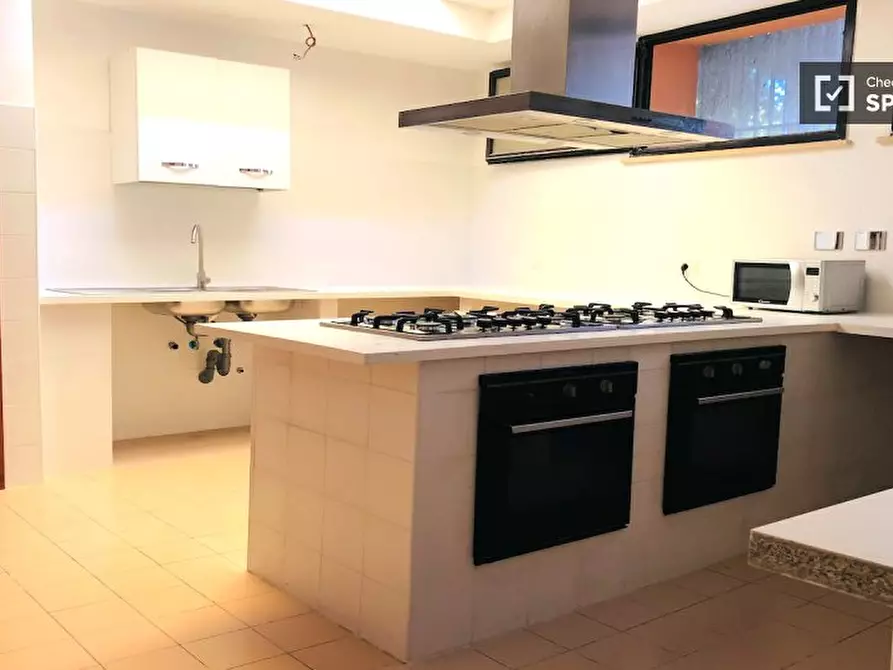 Immagine 13 di Camera condivisa in affitto  in Via Alessandro Brisse a Roma