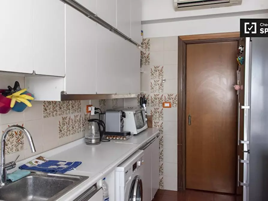 Immagine 16 di Camera condivisa in affitto  in Viale Cesare Pavese a Roma