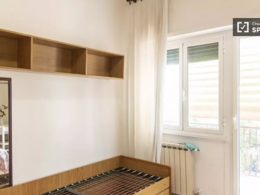 Immagine 8 di Camera condivisa in affitto  in Via Aurelio Mistruzzi a Roma