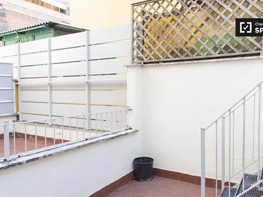Immagine 14 di Camera condivisa in affitto  in Via Portuense a Roma