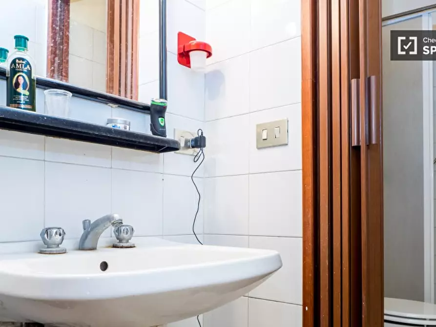 Immagine 17 di Camera condivisa in affitto  in Via Arquà a Milano