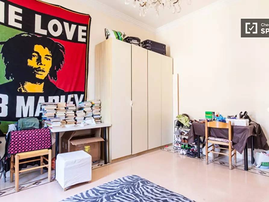 Immagine 4 di Camera condivisa in affitto  in Via Germano Sommeiller a Roma