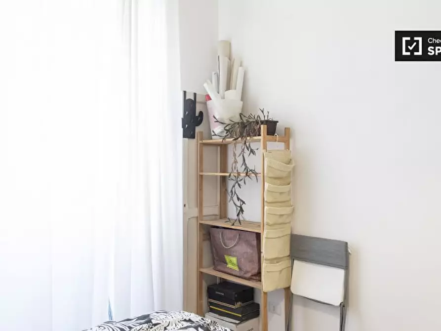 Immagine 2 di Camera condivisa in affitto  in Via Conte di Carmagnola a Roma
